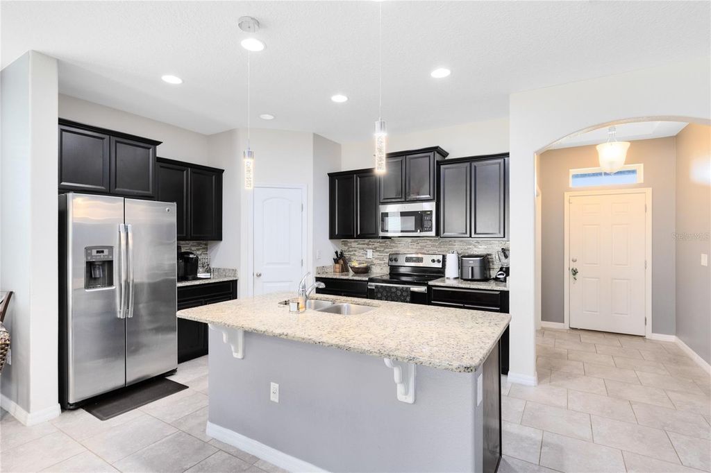 Photo of 2307 Beacon Landing Circle, Orlando, FL 32824 (MLS # O6377241)