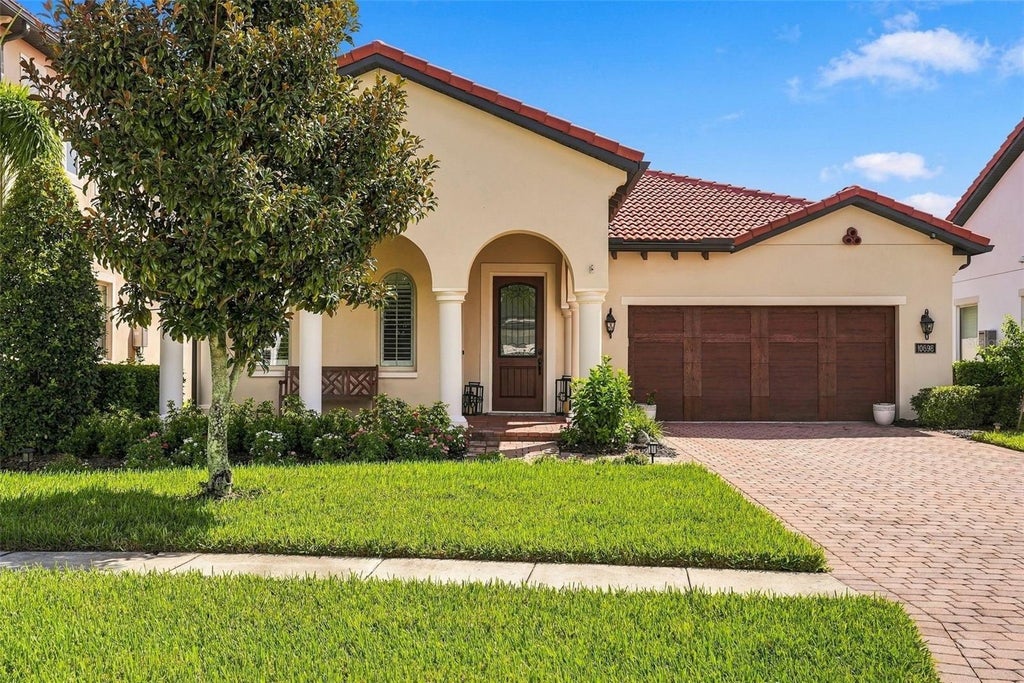 Photo of 10698 Royal Cypress Way, Orlando, FL 32836 (MLS # O6443682)