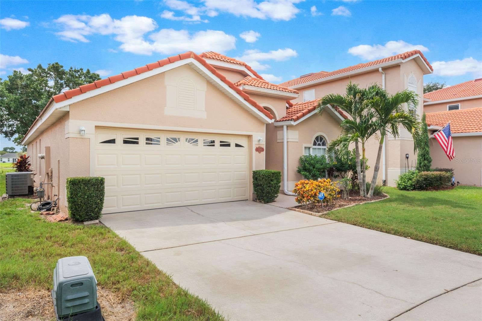 Welcome to this stunning single-story 3BD/2BA 1751 sq. ft. Villa with Water Views in the Gated community of Waterview Townhomes. The single-family home has been lovingly maintained as a second home by the owner. Nestled in the community, this home sits directly on Shingle Creek with serene long-range views of a tranquil pond. The property offers both privacy and picturesque surroundings, perfect for Florida living. As you drive up, you will be impressed with the Tile Roof and well-manicured landscaping of this home. Step inside to find elegant Bamboo Flooring in the main living areas. The light and bright living/dining area offers a private and flexible layout. Enjoy cooking in the open-concept kitchen, featuring granite counters, cabinets, and a breakfast bar. The family room will accommodate a breakfast nook or additional seating area and flows seamlessly into the covered patio, ideal for enjoying sunsets over the creek and pond. Double doors lead you into the spacious primary bedroom, offering views of the creek and pond. There is a separate walk-in closet and a luxurious en-suite bath complete with dual vanities, granite countertops, a garden tub, a separate shower, and a private water closet. A split-bedroom plan ensures privacy, featuring two additional bedrooms and a well-appointed full bathroom with a tub/shower combination. Further highlights include an indoor laundry room and a 2-car garage. This gated community offers peace of mind and maintenance-free landscaping, along with resort-style amenities including a clubhouse, tennis courts, fitness center, pool, and more. Waterview Townhomes is ideally located in the Williamsburg area, close to SeaWorld, Dr. Phillips, and O-Town West, with easy access to major highways. This home offers a perfect blend of convenience and tranquility. Hurry, and set up a private showing of this waterfront villa in one of Orlando's most desirable communities.