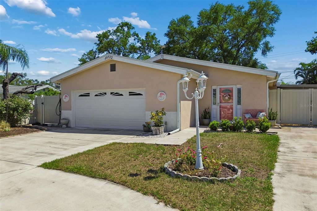 Photo of 10572 Blossom Lake Drive, Seminole, FL 33772 (MLS # TB8498010)