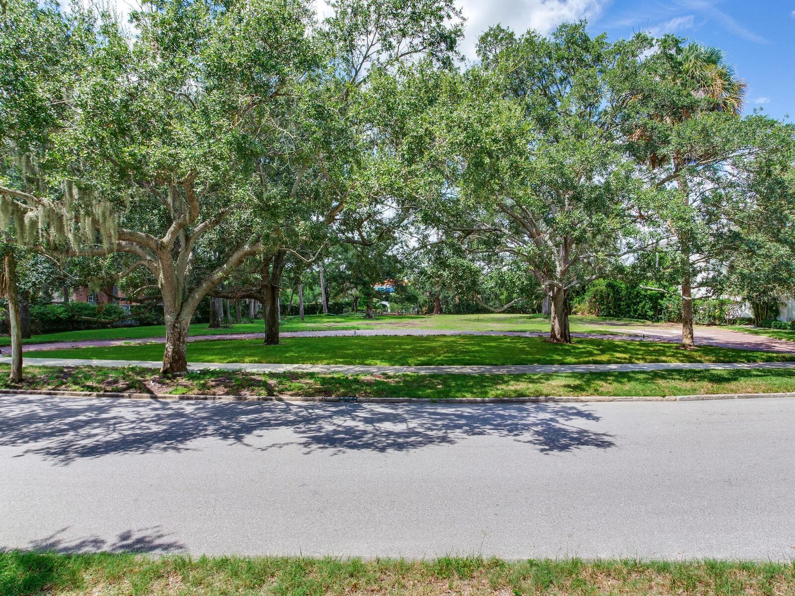 Prime Waterfront Lot for Sale at 5001 S Shore Circle, Tampa, FL Discover the perfect canvas for your dream home! Situated in the prestigious Beach Park neighborhood, this breathtaking waterfront lot offers an idyllic setting to create a custom residence that seamlessly blends luxury, privacy, and convenience. Imagine designing an outdoor pavilion with a one-of-a-kind kitchen, a resort-style pool, and even a guest house. Adorned with majestic oak trees and boasting direct canal access, this property perfectly balances natural beauty and exceptional functionality. Positioned across from a charming park island, this expansive lot provides serene views and an unmatched sense of tranquility. Located just minutes from Tampa International Airport, the International Mall, downtown Tampa, Gulf beaches, and premier attractions like sports venues and vibrant entertainment hubs, it offers a lifestyle that effortlessly integrates relaxation and excitement. Surrounded by top-rated schools and world-class dining options, this property is ideal for anyone seeking elegance and practicality. Additional Features: Whether you’re a boating enthusiast or simply dream of owning a premier waterfront property, this lot offers canal front access with a direct route to the open bay. The Beach Park community is celebrated for its picturesque streets, family-friendly atmosphere, and timeless appeal.