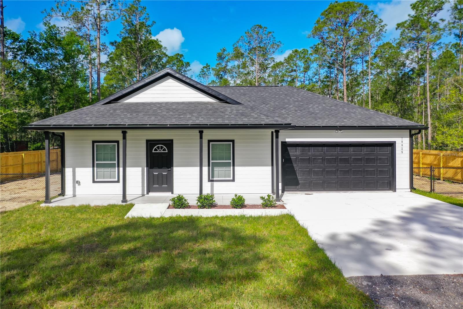 Seller is motivated ! This brand new 2025 built 3 bedroom 2 Bath home out in the country is for sale ! Situated on almost 2 acres,FULLY FENCED ,this home is perfect for someone who enjoys open space and modern amenities but likes their privacy! Luxury flooring throughout the house, spacious living room with plenty of kitchen space ,stainless steel appliances and modern light fixtures ! Walk -in closet in Master Bedroom ,Master Bath has his and hers sinks and a walk in shower. Spare bedrooms located on other side of the home for maximum privacy ,are light and bright, with ceiling fans already installed ! Open back patio is accessible through the slider in the kitchen door and opens up to a huge backyard. The property is fully fenced and is located only 20 mins each to either Saint Augustine, Palm Coast or Palatka ! Plenty of space for animals, RV /boat storage or pool ! Water and Septic test on file for FHA VA requirements,