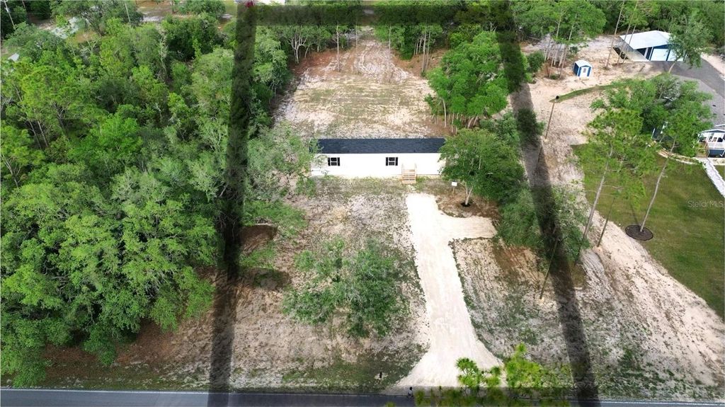 Photo of 8851 NE 105th Avenue, Bronson, FL 32621 (MLS # GC540668)