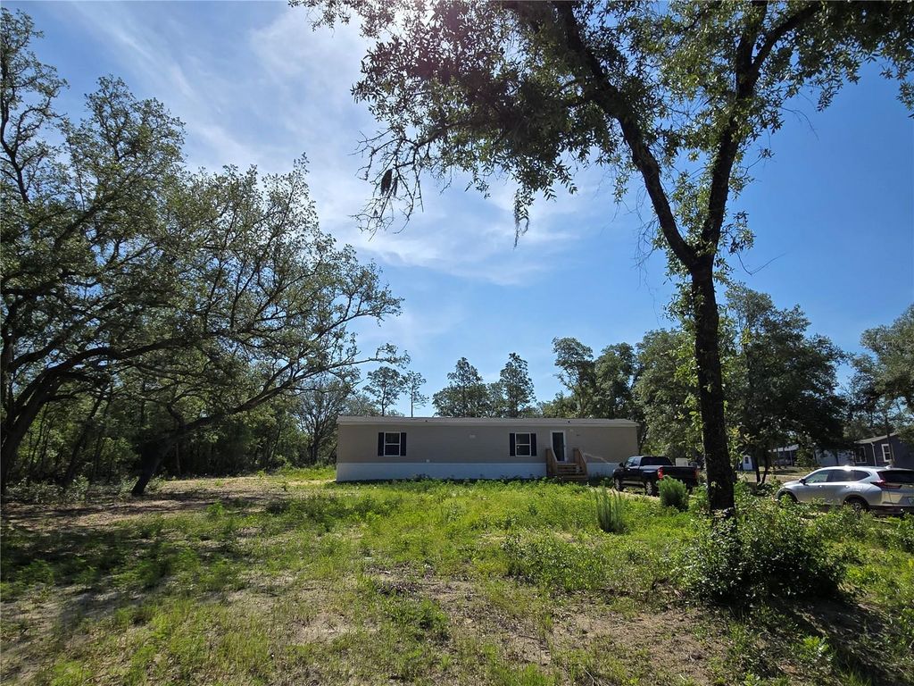 Photo of 8851 NE 105th Avenue, Bronson, FL 32621 (MLS # GC540668)