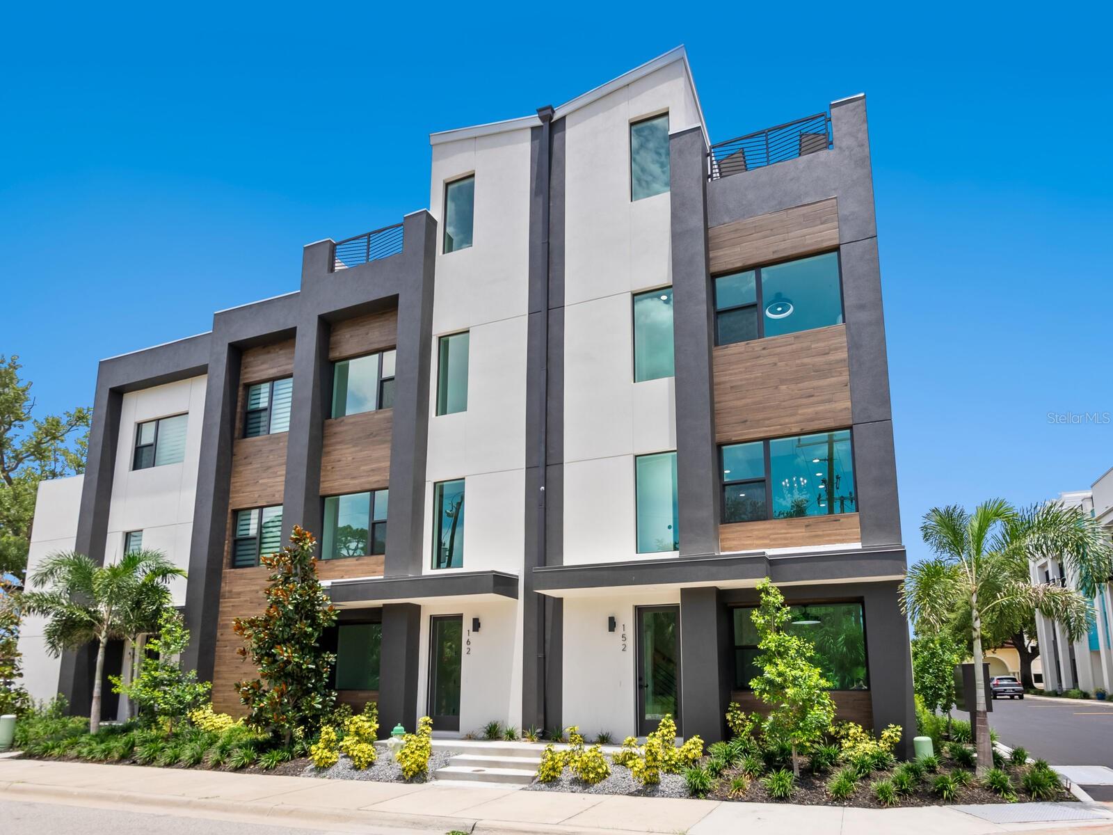 Are you dreaming of the ideal uptown location close to everything Sarasota? Discover modern Sarasota living with outdoor style at Premier on Main in the Park District at the east end of Main Street, downtown Sarasota. Ready to live your best Sarasota life? Welcome to Premier on Main, a just-completed collection of contemporary townhomes designed for those who crave outdoor living, accessible culture and modern style in the heart of Uptown as we call it. Near Main Street’s bustling arts and cultural district, farmers market, buzzworthy restaurants, live music venues and the new 53-acre bayfront park, this is your gateway to the ultimate Florida lifestyle. Morning runs over John Ringling Bridge. Sunset drinks on the rooftop. Bike to brunch or kayak the bay. This is the Sarasota experience elevated. Designed for your active, social life. Over 2,395 total square feet including 1,950 air-conditioned living space. Incredible 396-square-foot rooftop entertainment deck with optional hot tub and outdoor kitchen, ideal for sunny lounging or hosting friends under the stars. Spacious, light-filled living areas with soaring ceilings and designer finishes. Chef-inspired kitchen with oversized island and premium stainless appliances. Private elevator for easy living across all levels. Two bedrooms with en-suite baths and walk-in closets—room for guests, roommates or that home office you’ve always wanted. Urban convenient, Sarasota cool. Just blocks from the bayfront and downtown nightlife. Close to local cafes, restaurants, arts venues and farmers market. Bike-friendly location with easy access to parks and beaches. Sleek, contemporary architecture with high-end details. Energy-efficient systems and impact-rated windows and doors for safety and peace of mind. Practical perks for modern buyers. Private two-car garage with bonus flex space, ideal for gym, studio or gear storage. Low maintenance living with HOA covering landscaping, road upkeep and more. Move-in ready with special developer financing incentives available for a limited time. See why Sarasota millennials and modern buyers are choosing Premier on Main for their next-level urban lifestyle. Visit our fully furnished model next door at 2170 Fruitville Road. Open weekends noon-3 p.m. or by appointment. Contracts are being accepted now so grab your slice of downtown Sarasota before it’s gone!