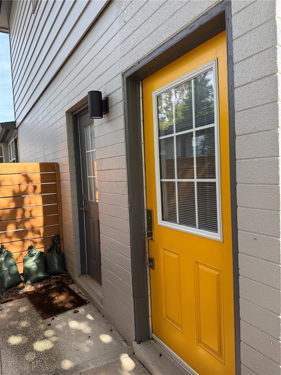 Tucked away in the desirable Delaney neighborhood, this beautifully updated 1-bedroom, 1-bath garage apartment blends modern finishes with timeless charm. The kitchen showcases brand-new cabinetry, quartz countertops, a striking tile backsplash, and hardwood floors, all bathed in natural light for a warm and welcoming feel. The spacious bedroom easily fits a king-size bed with dressers, and the bathroom has been tastefully renovated with stylish touches. Additional features include an in-unit washer and dryer, plus access to a fully fenced backyard with a large, covered deck—perfect for relaxing or entertaining under the Florida sun. Yard maintenance is conveniently taken care of by the owner. Ideally located within walking distance to the highly rated Blankner K-8 and Boone High School, and just minutes from SoDo, Delaney Park, Colonialtown South, the Milk and Hourglass Districts, ORMC, I-4, 408, and a wide variety of shops, restaurants, and grocery stores.
