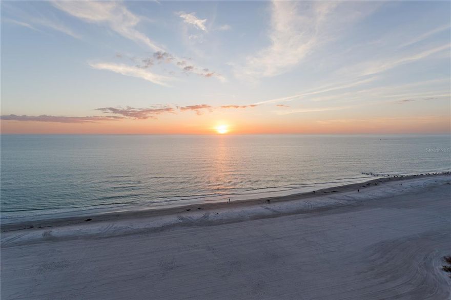 Come live the beach life in this stunning 15th-floor condo overlooking the Gulf of Mexico in beautiful Redington Shores! Enjoy breathtaking, unobstructed views and spectacular sunsets right from your private 26-foot balcony—or head down to the beach and feel the sugar-white sand between your toes. As an added bonus, this unit has TWO assigned parking spaces. This light and bright 1-bedroom, 1.5-bath residence offers just under 1,000 square feet of thoughtfully designed living space. The updated kitchen features marble countertops, soft-close shaker cabinetry, and a striking blue-green backsplash that perfectly echoes the ocean beyond your windows. Ocean views flow seamlessly through the kitchen, dining area, living room and even into the spacious bedroom. The bedroom suite is impressively large—over 220 square feet—with ample room for a sitting or office area. It also includes a makeup vanity, walk-in closet and private bath. Tile flooring extends throughout the entire unit—no carpet to worry about! Additional perks include one covered parking space (with an optional second space available for purchase) and a host of resort-style amenities: a beachfront pool, direct beach access, grills, fitness center, storage area and more. Condo dues decreased for 2026 from $881 to $797/month and conveniently cover water, sewer, trash, cable, and internet. Whether you’re seeking a vacation getaway or a full-time coastal retreat, this condo checks every box. Be sure to explore the 3D Virtual Tour, then schedule your private showing to experience beachfront living at its finest!