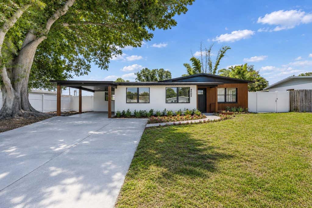 Photo of 4502 S Grady Avenue, Tampa, FL 33611 (MLS # O6416394)