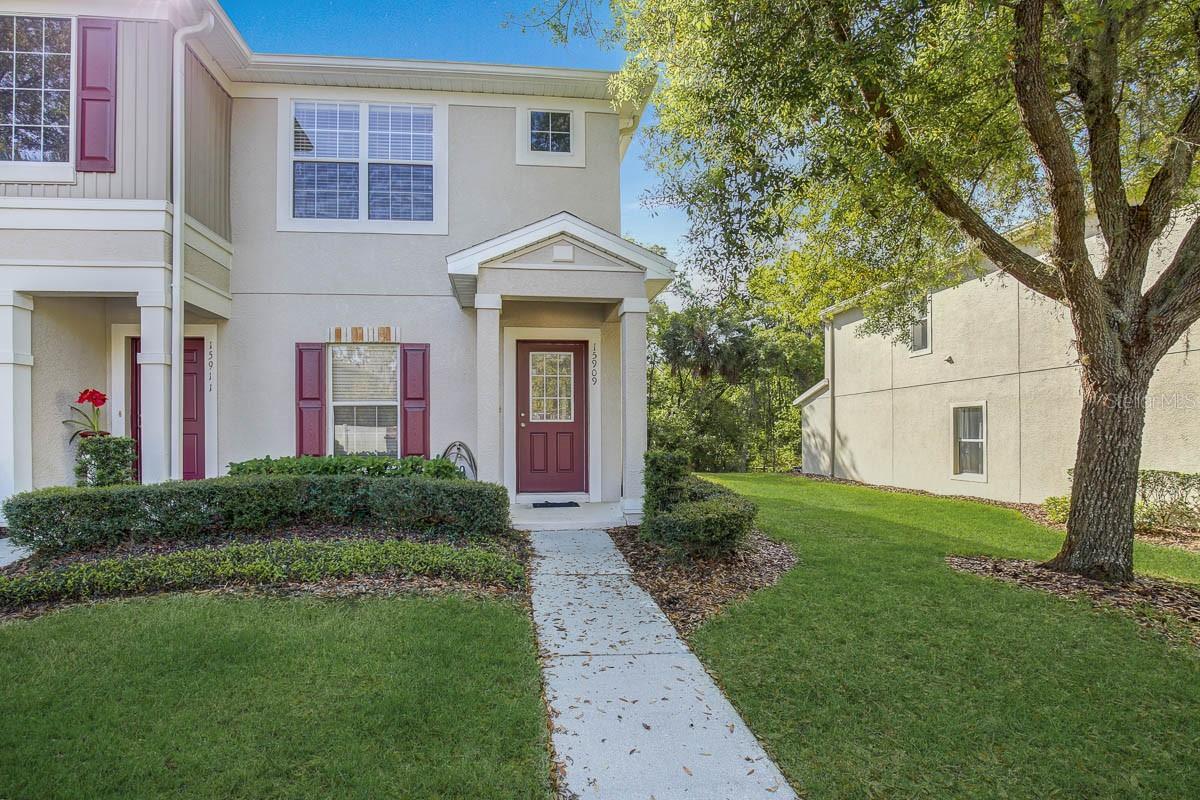 This 2 Bedroom, 2.5 Bath corner unit townhome in the gated community of Fishhawk Ridge is just what you’ve been looking for! Tucked in a quiet location away from the main road and backyard views of a conservation area means plenty of peace and quiet. Enter the home to an inviting open floor plan with a living and dining combo that has plenty of room to entertain. The spacious kitchen features plenty of neutral-toned cabinets with coordinating counters, and a pass-thru area to the dining and living room allowing for easy conversations with guests. An eat-in area in the kitchen opens up to the extended patio overlooking the wooded conservation area perfect for expanding your entertaining space. There is a half bath downstairs for guests and convenience. Upstairs you’ll find two generously sized bedrooms each with a full-size en-suite bath, walk-in closets, and neutral tone walls and carpet. For added convenience, the laundry closet is located on the second floor making that chore easier! A close by community pool offers a place to soak up the Florida sunshine. Complete lawn maintenance and trash collection are provided by the HOA saving you time and money. Fishhawk Ranch is a fabulous community with easy access to pools, parks, playgrounds, miles of walking trails, fitness centers, tennis courts, and park square featuring restaurants, shops, and community events.