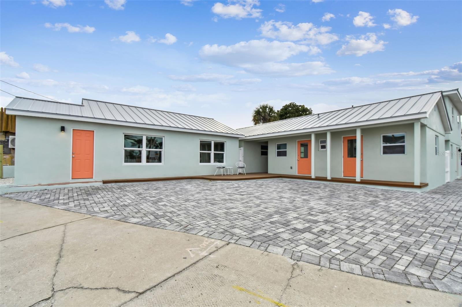 Under contract-accepting backup offers. 8 unit airbnb complex that is for sale, in the beaches! This is less then 450 ft to public beach access with no roads to cross! This could be the holy grail of an Airbnb with its Commercial Tourist Facilities (CTF) zoning which allows nightly rentals. Bring your most discerning clients! Fully renovated- Aluminum pvd plated roof, custom window solutions impact windows, full euro kitchen's with quartz countertops, glass backspalshes, new bathrooms with shell inspired tile, new showers, flooring, vanities, toilets, new stiebel tankless water heaters, complete rewire including new panels, new permeable paver system for entire property making the property zeroscaped, new Cali bamboo long plank flooring, new mini splits in 7 of the units, new uponor pex water lines for the entire property, new soffit and fascia, new stucco with new lathe even on the block for long lasting installation, the list just goes on and on. There are 8 parking spots on site. There are several restaurants and bars withina block. The property is prepared for a 12 person hot tub in the center courtyard with power already ran underground, there is space to add a pool/hot tub. All units share same exact material for a cohesive look. Agent is owner.