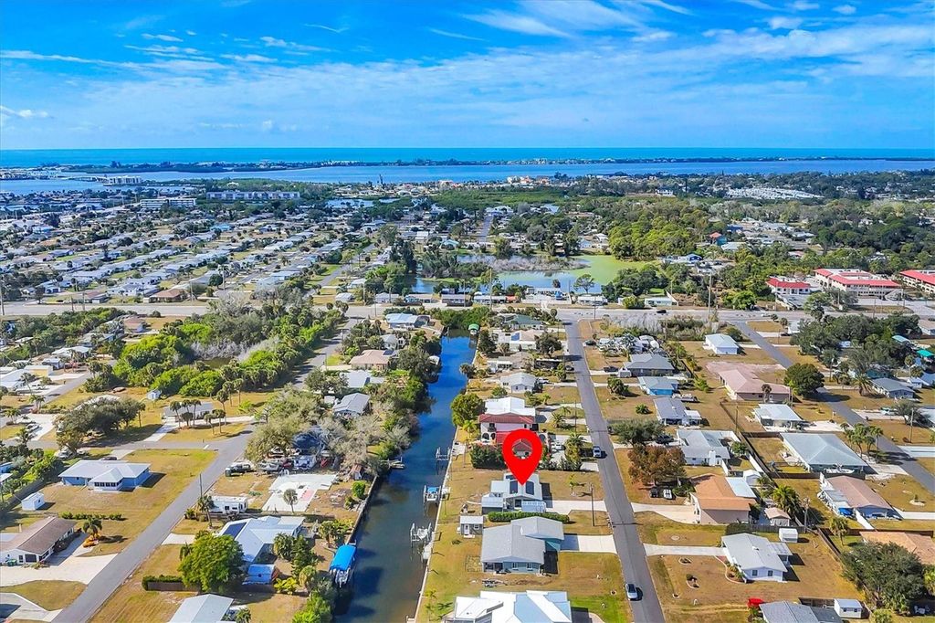 Photo of 825 E 5th Street, Englewood, FL 34223 (MLS # A4676812)