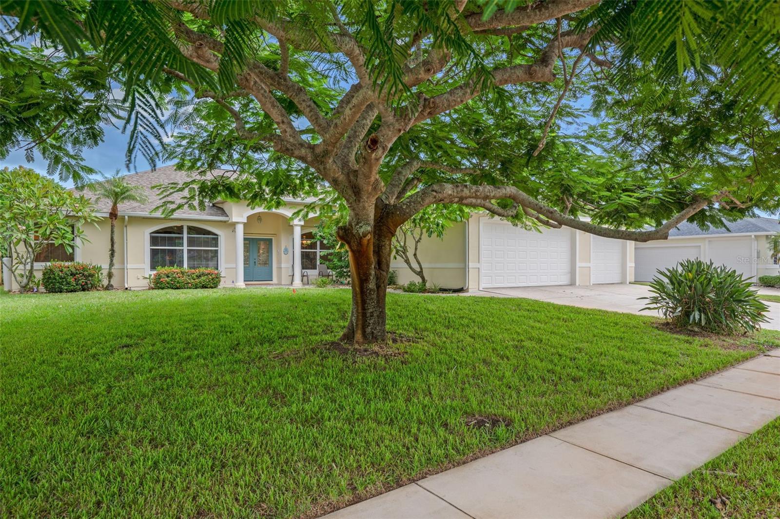 Welcome to your slice of paradise at 390 Treasure Lagoon Lane, nestled in the exclusive gated community of Merritt Island, FL. This luxurious single-family residence boasts 4 spacious bedrooms and 3 pristine bathrooms, designed for anyone seeking the ultimate coastal living experience with the convenience of boat access.
As you step onto the covered, welcoming front porch and through the double door entry, you'll be greeted by formal living and dining rooms setting the stage for elegant gatherings. The heart of the home features ceramic tile throughout, a generous island bar with additional cabinet space, a built-in wine rack, and barstool seating. The chef's kitchen shines with granite countertops, tall cabinetry, stainless steel appliances, and a walk-in pantry, complemented by a cozy breakfast nook.
Sliding glass doors from the nook and family room invite you to a screened-in pool and spa oasis, designed for the perfect entertaining experience. Enjoy the new pool equipment, including a resurfaced saltwater system and heated spa.
The three-car garage, with pull-through boat access to the backyard, offers convenience for the boating enthusiast with private community access to a boat ramp leading directly into the Indian River.
Retreat to the primary suite with two walk-in closets and lanai access. The en-suite bathroom features dual solid surface vanities, a jetted garden tub, and a dual showerhead walk-in shower. Additional bedrooms offer privacy and comfort, including an in-law guest suite with a French door entry and its own private bath.
This meticulously maintained home includes a 2025 home water conditioner, 2017 hot water heater, hurricane shutters.
The pool with jacuzzi was resurfaced and refurbished 2025 as well as a new pool filter and heat pump , pool light system in 2025 , pool deck repainted in 2021 pool salt chlorinator, ,roof replaced in 2017. two air-conditioning units. main house replaced in 2013. The master bedroom has its own replaced in 2025. Not to mention all of these updates, The stove 2021, refrigerator 2025 ,hot water heater 2017,exterior paint 2022. The dishwasher 2019 , garage door spring replaced in 2019, Septic tank pumped out August, Revel in spectacular views of shuttle launches, close proximity to beaches, shopping, dining, and more. Discover your dream lifestyle at 390 Treasure Lagoon Lane – where luxury meets coastal living.