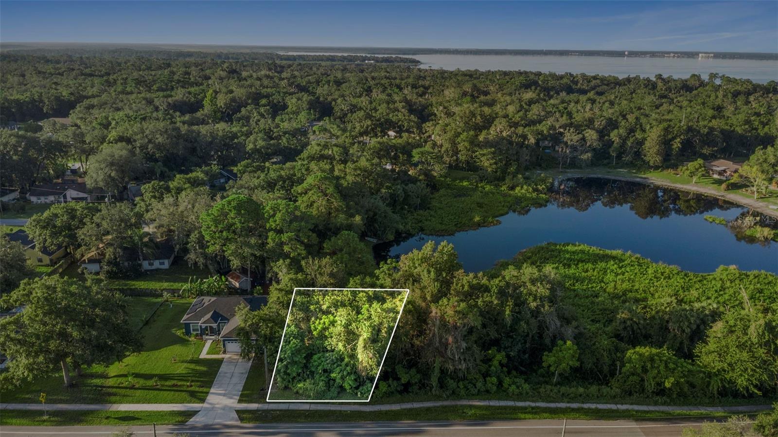Buildable & LAKE-FRONT! Vacant Lot .25 acres, on tranquil Lake Vista. Which is apart of scenic Lake Monroe. Featuring road frontage, nearby commercial zoning, and ideal access to I-4, shopping, and schools. A rare opportunity!