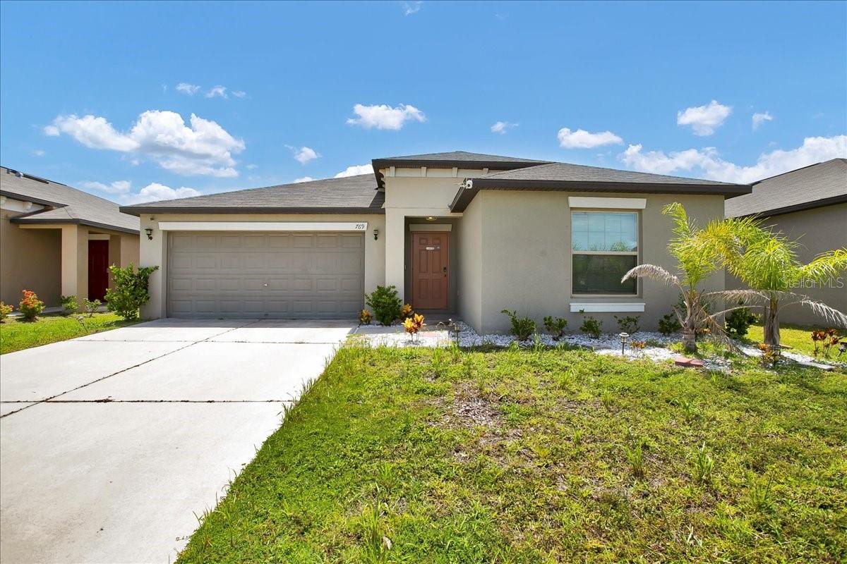 WELCOME HOME!! This Magnificent LENNAR built HARTFORD model offers 1935SF living space built in 2020. This Home boasts 4 bedrooms, 2 bathrooms and a spacious open floorplan that features a large Great Room, Eat-In Kitchen with oversized granite island and a Dining Room. The high ceilings coupled with the open floorplan create a living space that is both spacious and cozy at the same time. This home has a vibrant floorplan has three bedrooms at the front of the house and the Master is offset on the opposite side at the rear of the house, which allows privacy. The main living areas are centered between the two sleeping areas which includes the Spacious Great room for all your family gatherings! The Hugh Master Bedroom features a large westerly facing window to capture those beautiful nightly sunsets. It also features an Ensuite Bathroom with a huge walk-in Shower, double sinks, a separate room for the Commode and a roomy Walk-In Closet. The home has both large backyard and a beautifully manicured front yard. This home has it all! Be ready to Fall in love at your first viewing!