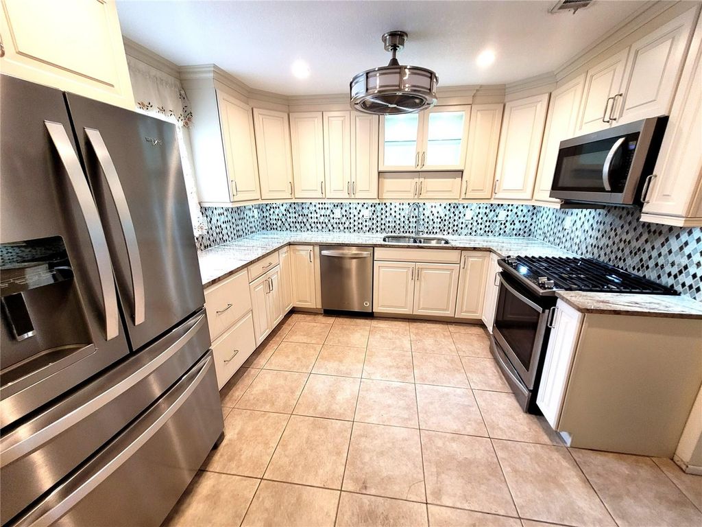 Photo of 4999 Springwood Court, Pinellas Park, FL 33782 (MLS # TB8498592)