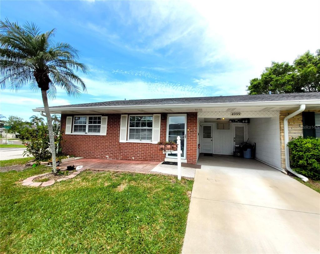 Photo of 4999 Springwood Court, Pinellas Park, FL 33782 (MLS # TB8498592)