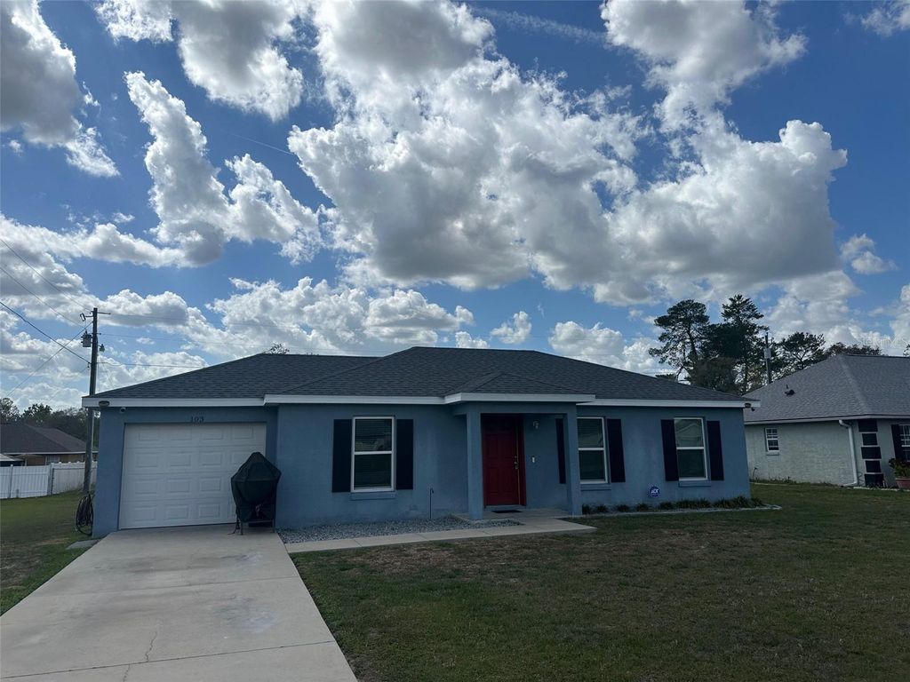 Photo of 103 Marion Oaks Drive, Ocala, FL 34473 (MLS # OM721543)