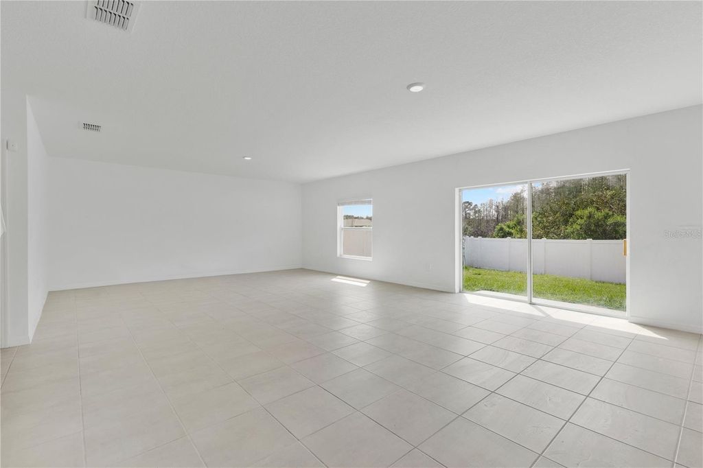 Photo of 557 Pink Ibis Bend, Saint Cloud, FL 34772 (MLS # S5146064)