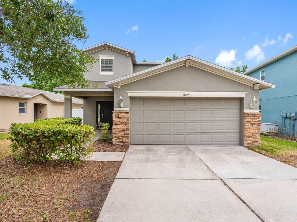 Photo of 18320 Snowdonia Drive, Land O Lakes, FL 34638 (MLS # TB8389308)