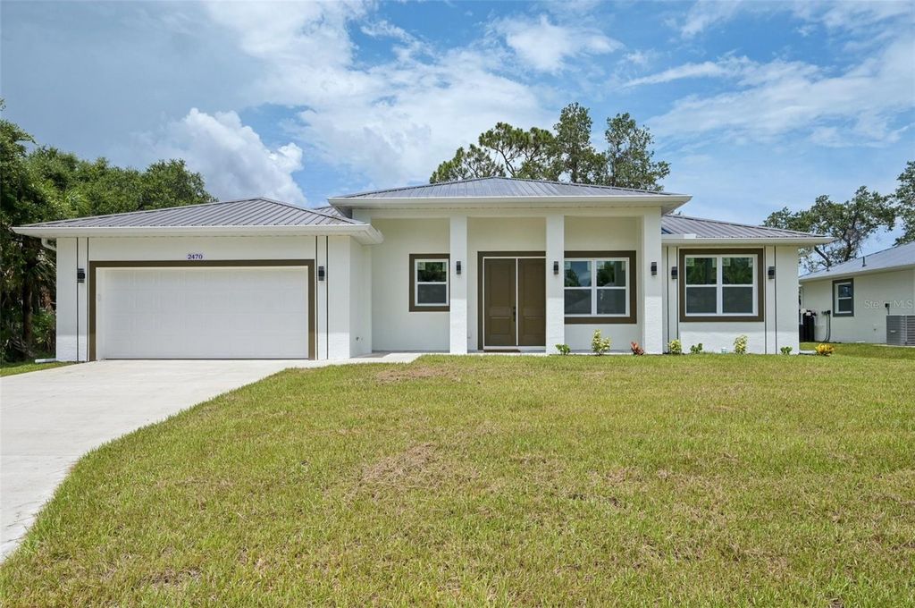 Photo of 2470 Talwood Terrace, North Port, FL 34288 (MLS # A4660941)