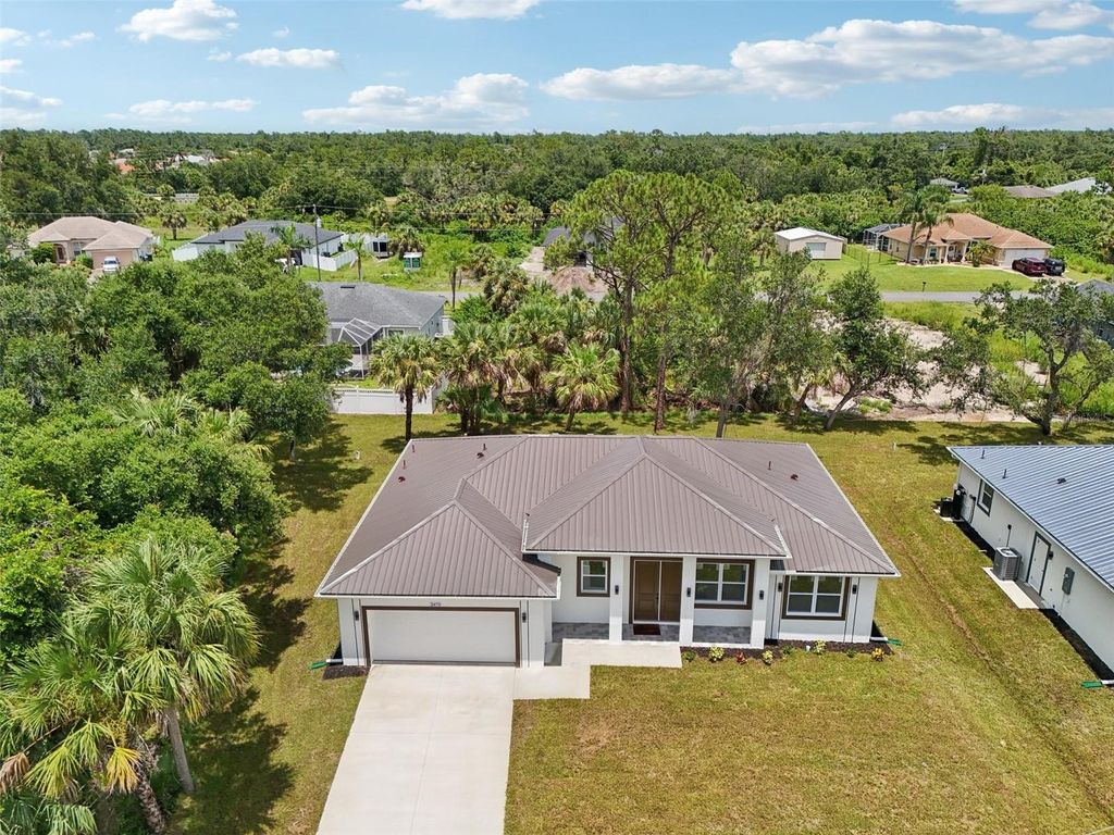 Photo of 2470 Talwood Terrace, North Port, FL 34288 (MLS # A4660941)