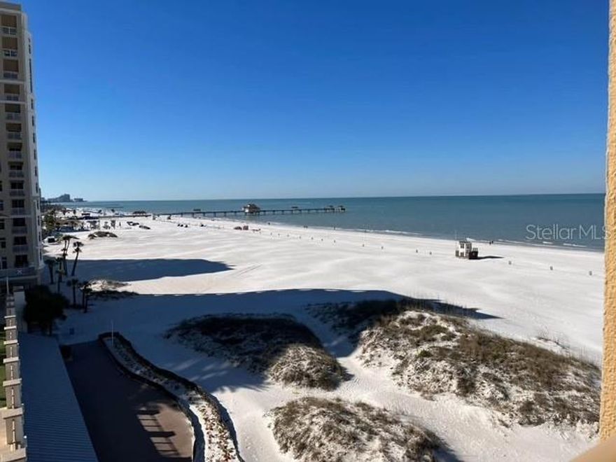 Enjoy luxury beachfront living at The Residences at Sandpearl. Step into paradise in this beautiful 3 bedroom, 3.5 bath condo perched on the 6th floor of this prestigious building in the heart of Clearwater Beach. This upscale unit offers panoramic views of the Gulf and features elegant designer finishes providing the ultimate in coastal comfort. Enjoy the private balcony with unparalleled Gulf beach views, gourmet kitchen complete with granite counters & stainless steel appliances, spacious laundry room with in-unit washer & dryer, and secure entry building with reserved parking. Enjoy resort-style amenities including direct beach access to the sugar sands of Clearwater, a heated pool & spa, fitness center, and 24-hour concierge & security. Located just steps from top-rated restaurants, boutique shopping, and popular Pier 60 - this is Clearwater Beach living at its finest! Available for long-term lease.