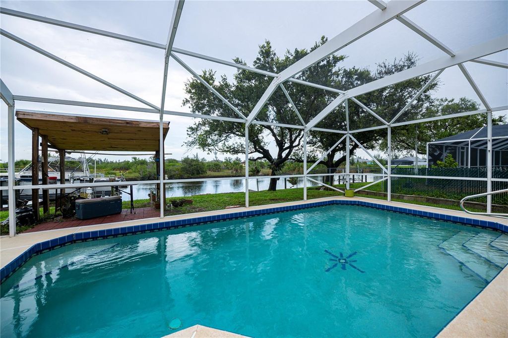 Photo of 8861 Calumet Boulevard, Port Charlotte, FL 33981 (MLS # C7512181)