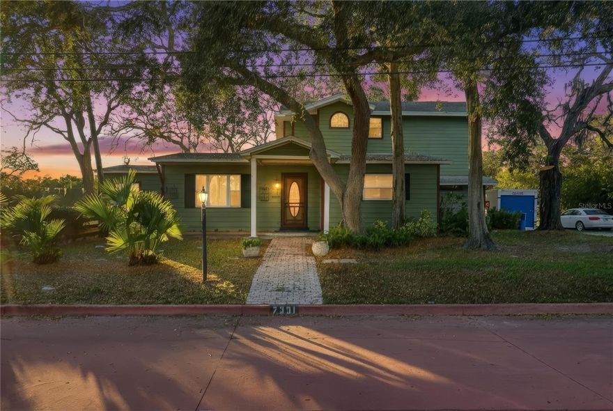 One-of-a-kind opportunity in the highly sought-after Pink Streets! This exceptional property directly abuts the scenic 9-acre Pinellas Point Park, offering magnificent park views from nearly every room—truly like living in the country while being in the heart of St. Petersburg.The expansive two-story home features a stunning upstairs primary suite spanning over 800 square feet, complete with vaulted ceilings and breathtaking, unobstructed park views that create a private retreat unlike any other. The updated kitchen boasts a butcher block island and opens seamlessly to the living spaces, perfect for entertaining or everyday living. A bright Florida room provides the ideal spot to relax and take in the tranquil surroundings.Additional highlights include an oversized two-car garage with ample space for vehicles, storage, and all your toys. Properties in this unique setting rarely become available—don’t miss your chance to own a truly special home in one of St. Pete’s most iconic and desirable neighborhoods.