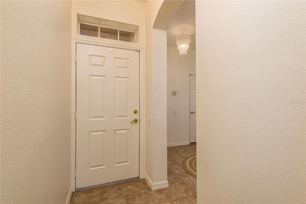 Photo of 3349 Covered Bridge Dr W, Dunedin, FL 34698 (MLS # TB8481257)