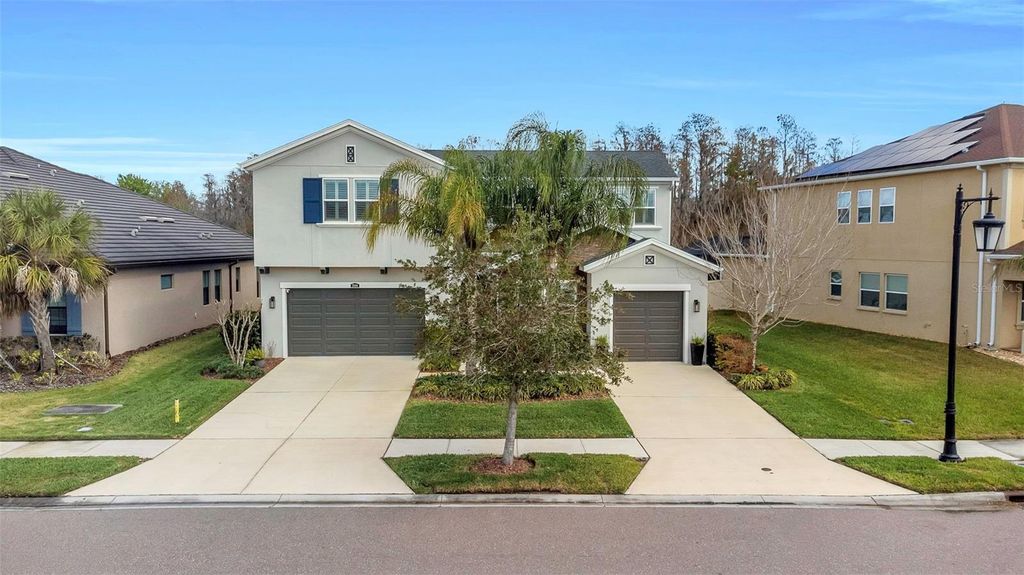 Photo of 29494 Picana Lane, Wesley Chapel, FL 33543 (MLS # TB8483977)