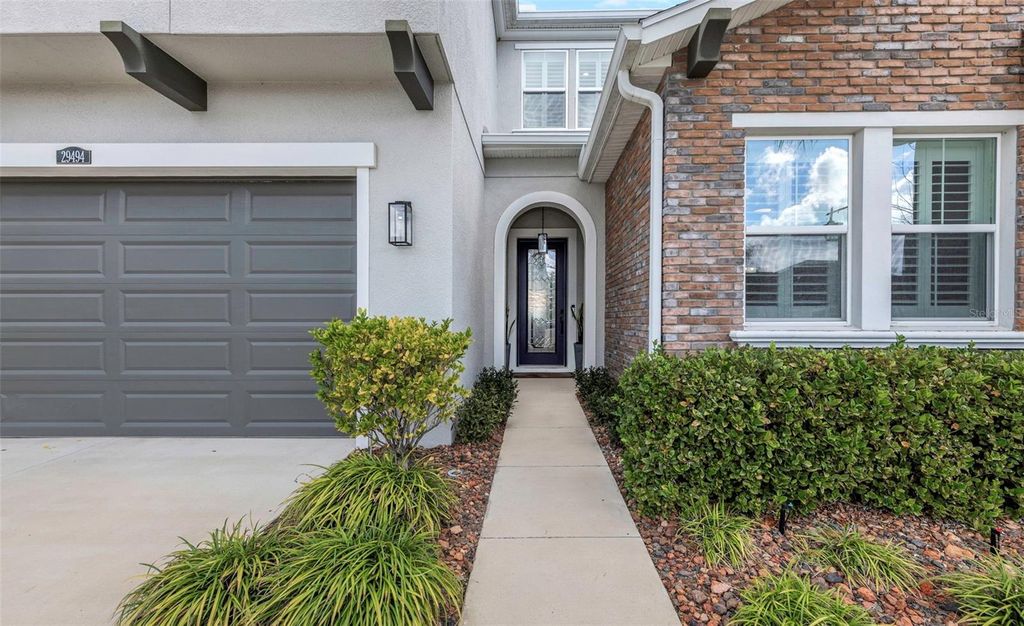 Photo of 29494 Picana Lane, Wesley Chapel, FL 33543 (MLS # TB8483977)