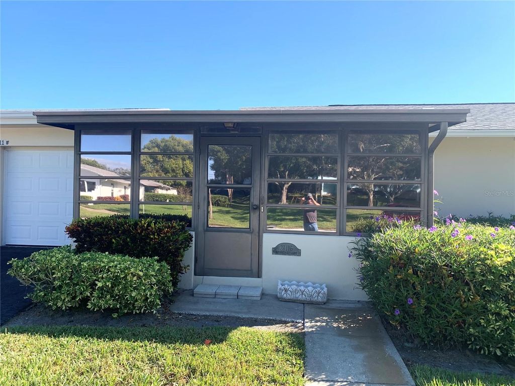 Photo of 2711 Sherbrooke Lane #B, Palm Harbor, FL 34684 (MLS # GC534188)