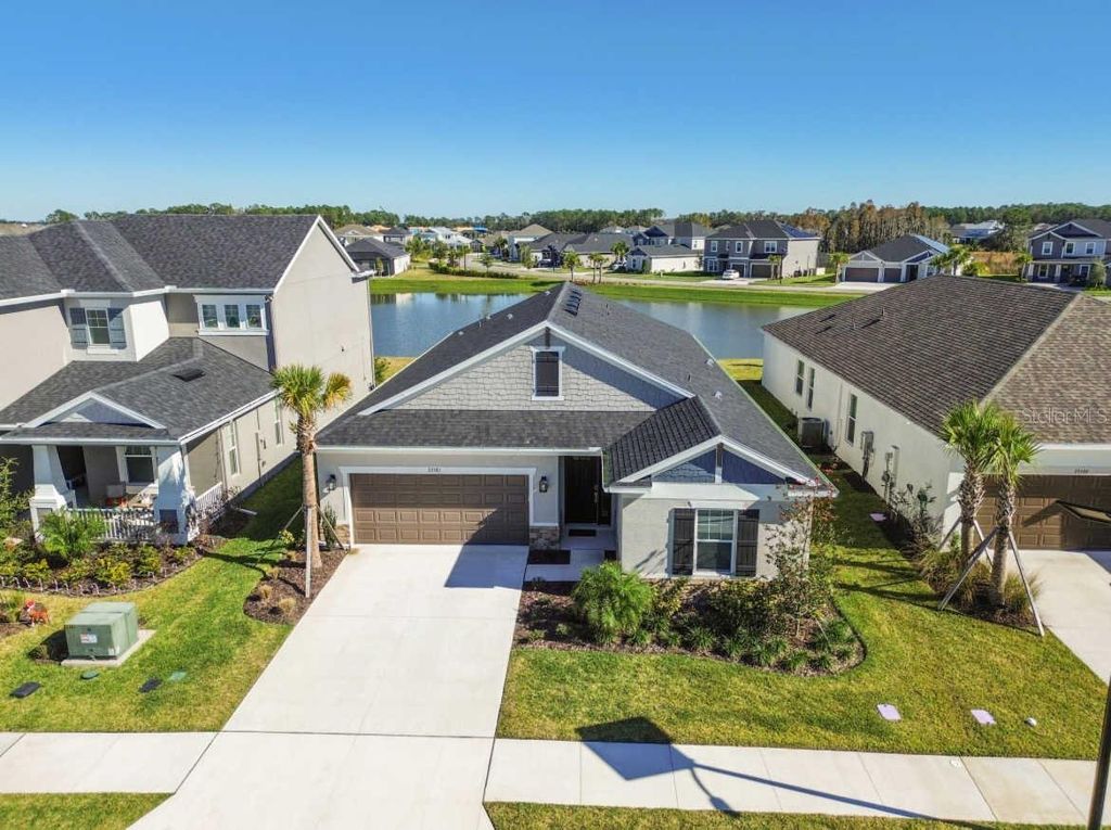 Photo of 33581 Castaway Loop, Wesley Chapel, FL 33543 (MLS # O6168769)