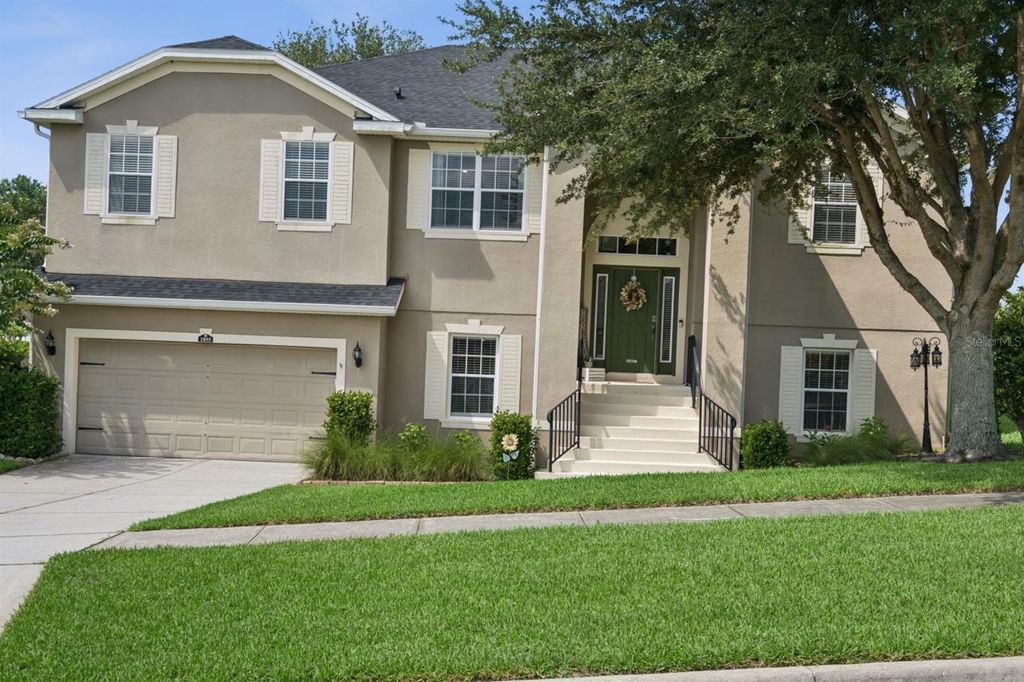 Photo of 1855 Mariposa Way, Clermont, FL 34711 (MLS # O6419648)