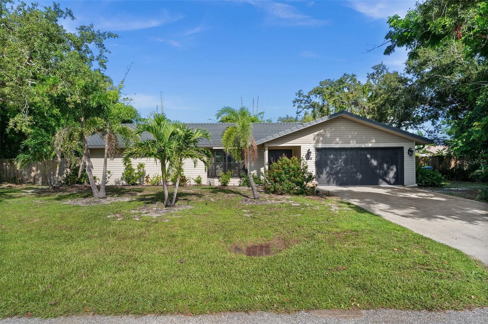 Welcome to your beautifully remodeled South Venice pool home, set on an oversized quarter-acre lot with no HOA and no deed restrictions. This property combines style, comfort and convenience in one perfect package. Step inside to a bright and open floor plan with abundant natural light, laminate flooring, upgraded lighting, fresh paint and detailed trim work throughout. The spacious living room features an electric fireplace, flowing seamlessly into the dining area and stunning custom kitchen with quartz countertops, matching backsplash, high-end stainless steel appliances and plenty of counter space for cooking and entertaining.
The spa-inspired primary suite offers double vanities, a walk-in closet and a fully updated shower. Additional upgrades include a resurfaced pool, vinyl siding, fence, upgraded landscaping and new washer and dryer. Major improvements provide peace of mind with a brand-new roof, new A/C, new pool heater and new water softener.
Enjoy Florida living year-round with the expansive 35x10 covered lanai, a fully fenced backyard and room for your boat, RV or jet skis. The home is just minutes from Shamrock Park and the Venetian Waterway Trail with its bike paths, tennis courts and nature trails, Caspersen Beach, Sharky’s, Venice Island, shopping and dining.
Don’t miss the opportunity to make this move-in-ready home yours!