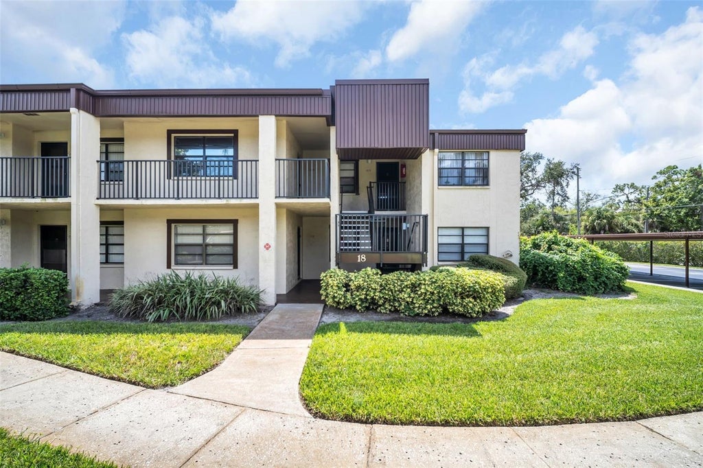 Photo of 2400 Winding Creek Boulevard #18-105, Clearwater, FL 33761 (MLS # TB8548453)