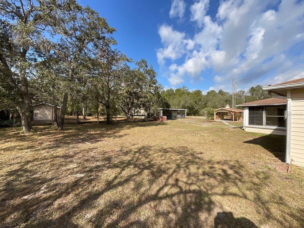 Photo of 15839 Hicks Road, Hudson, FL 34667 (MLS # O6373116)