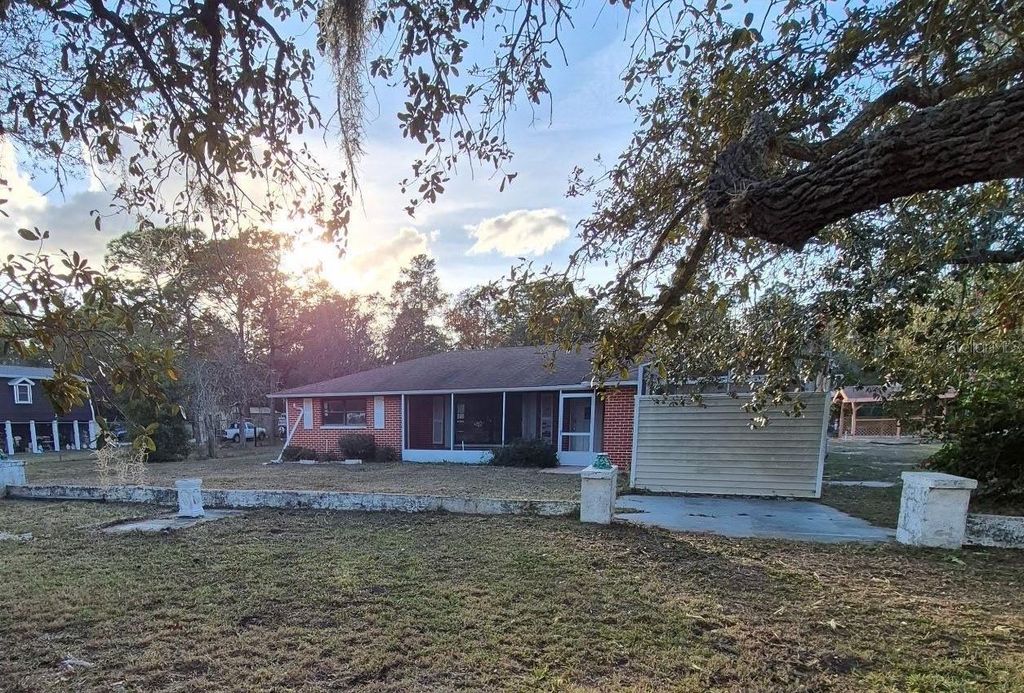 Photo of 15839 Hicks Road, Hudson, FL 34667 (MLS # O6373116)