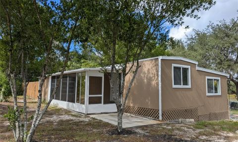 Photo of 9761 Lake Drive, Weeki Wachee, FL 34613 (MLS # TB8457872)