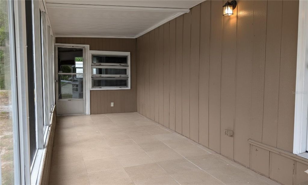 Photo of 9761 Lake Drive, Weeki Wachee, FL 34613 (MLS # TB8457872)