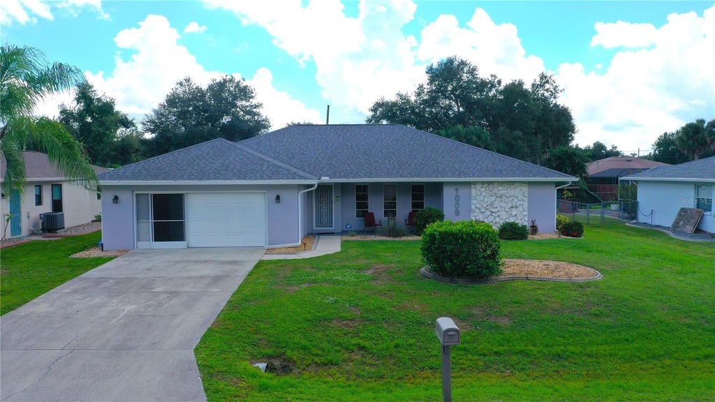 Photo of 1009 Labelle Terrace NW, Port Charlotte, FL 33948 (MLS # C7532166)