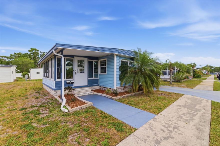 Don’t miss this incredible chance to own your own piece of paradise! This fully furnished 2-bedroom, 1-bath home is move-in ready—just bring your clothes and toothbrush. Featuring a bright, open floor plan, the property has been meticulously cared for and thoughtfully updated.

Relax in the inviting screened porch, complete with comfortable seating, a TV, market lighting, and a spacious storage room. There’s also an additional open patio area, perfect for enjoying the outdoors. Recent upgrades include a new roof-over (2021), updated subflooring in the living room and hallway, and new laminate flooring throughout. The Florida room is equipped with its own brand-new AC/heat unit, and the main HVAC system has been updated in 2025. Solar panels installed over the carport help keep electric costs low.

Situated in a resident-owned community with generously sized lots, you’ll enjoy extra space and privacy. Amenities include a heated pool, social activities, and well-maintained outdoor areas. Rentals are not permitted.

Conveniently located near shopping, dining, and beautiful local beaches—come experience the best of the Florida lifestyle!