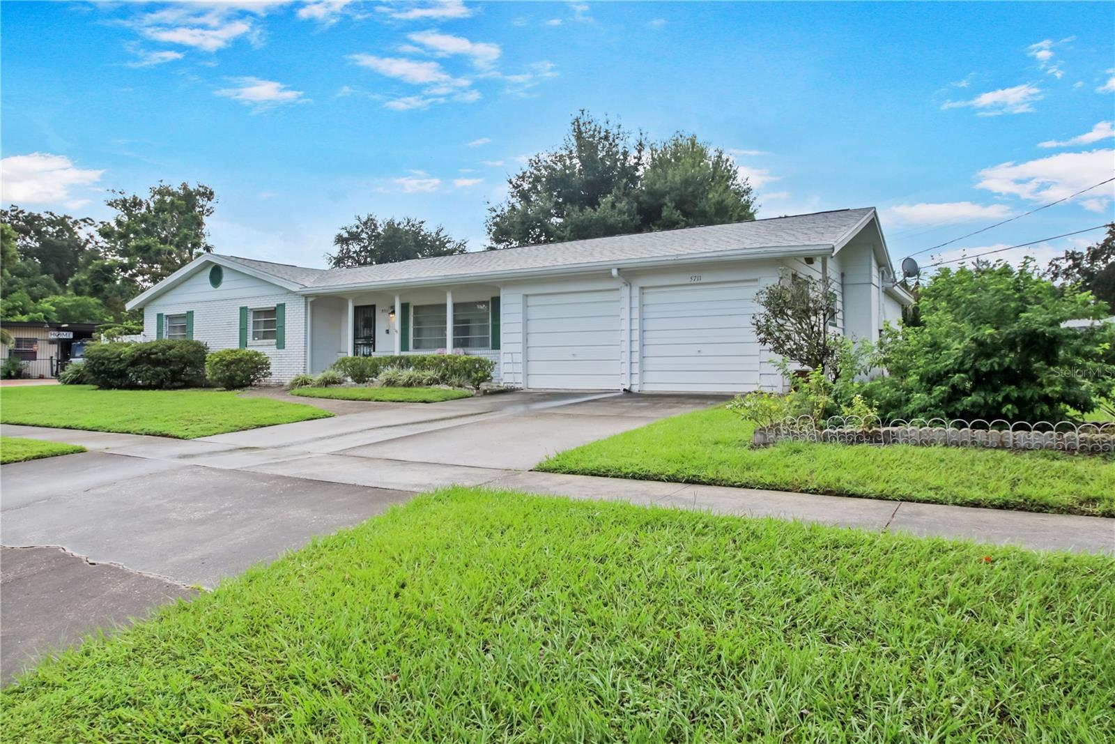 This Charming home sits on a beautiful .34 acre lot in Kingswood Manor, an established Orlando neighborhood. From the moment you drive up, you will be impressed with the serene setting of this 3BD/2BA home with a cozy front porch. Enter the foyer and discover a traditional layout with a bright living room and dining room. The renovated kitchen features granite counters, wood cabinets, a hood vent, and corner cabinets. Enjoy gatherings in the Family Room with windows looking out onto the fabulous backyard. The primary bedroom and ensuite await your finishing touches. Two other bedrooms and a hall bath with a tub have plenty of renovation potential. A covered and screened patio extends the living space outdoors, ideal for entertaining or relaxing year-round. Newer washer and dryer are located in the Utility area. There is also a Workshop and a two-car garage. Nestled on close to a third of an acre, this property boasts a huge backyard that can easily accommodate a Pool, Firepit, Summer KItchen, a Hammock, Swing, and a Garden. This quaint and quiet street boasts homes that have been lovingly maintained. Now is your opportunity to make this home a one-of-a-kind home with your personal touch. Kingswood Manor community does not have an HOA; however, it does have a Community Pool and Park for residents. The location is perfect for getting to College Park, Winter Park, Altamonte Springs, Major highways, Shopping, Churches, and more.
NEW ROOF COMPLETED IN AUGUST OF 2025. HURRY, and schedule a private viewing of this home today.