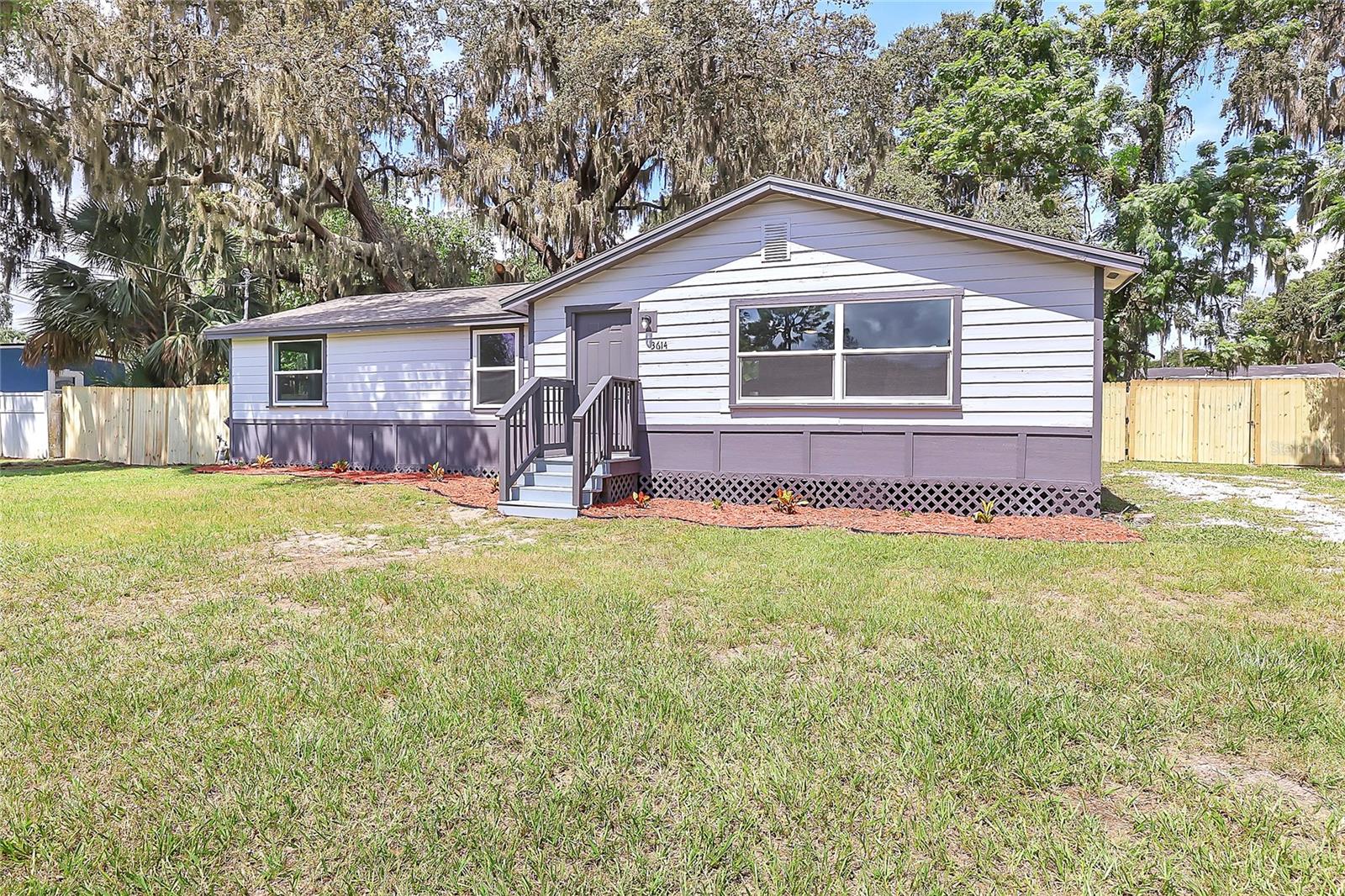 This Apopka home is move-in ready with all new LVP flooring throughout. The updated kitchen features granite countertops and new white cabinets, and both bathrooms have been refreshed. Major updates include a new roof (2025), newer water heater & HVAC, and recent electrical upgrades with a new 150-amp electrical meter can and main outdoor 150-amp panel for added safety and reliability. Enjoy the freedom of no HOA and a backyard with a wooden fence for added privacy. Conveniently located near Lake Apopka and the Lake Apopka Loop Trail for outdoor recreation, with easy access to Highway 429 for commuting. Just a short drive to shopping, dining, and schools.