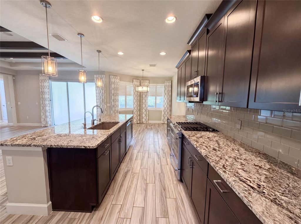 Photo of 1011 Victoria Hills Drive S, Deland, FL 32724 (MLS # O6435747)