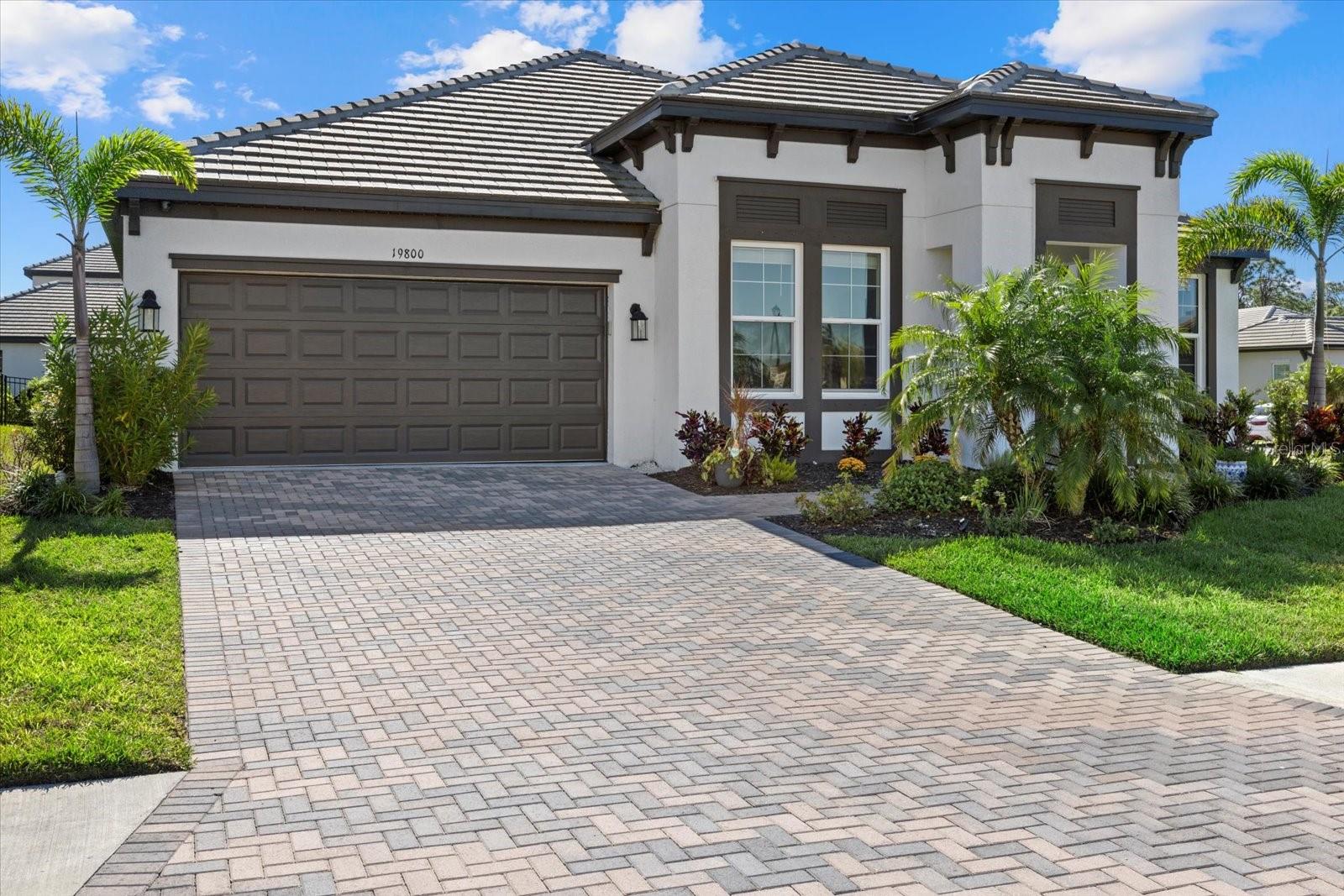 A place where everyone has their own space within this FIVE bedroom home, yet everyone can easily come together in the welcoming shared areas – Have a golf cart or extra toys to stow away? Do so in the THREE car TANDEM garage; safely built up & in an X flood zone; NO FLOOD INSURANCE REQUIRED! - welcome to your family's next chapter!
<br>
<br>
Entering into the home, you'll find an elegant foyer separating two generously sized bedrooms on one side from an in-law suite set up with large bedroom & private bathroom on the other side. All bedrooms have cozy soft carpeting & an abundance of natural light through the large windows. At the rear of the home sits the heart of the home, the large open area featuring the kitchen, great room & dining room. This inviting area is perfect for connecting within everyday small family gatherings or inviting others over & entertaining. The elegant & sleek kitchen features stainless steel appliances including a beautiful focal stovetop hood atop an eye catching herringbone subway tile backsplash, quartz counters, white slow close drawers & cabinets (including two large cabinets with convenient pull-out storage drawers for all your pots & pans) and an island with room for plenty of barstools! Want a sit down meal? The large dining room could easily accommodate a table to host 6-8 for dinner. The great room showcases a tray ceiling, recessed lighting & plenty of additional room to gather. Three large sliders open up the great room for additional natural light or continued fun outside. Live the true Florida lifestyle with your own HEATED SALTWATER POOL with coloring changing fiber optic lighting, professionally installed pool basketball hoop & available volleyball net. Place the grill master at the helm of the gas grill within the OUTDOOR KITCHEN located under the covered lanai. Watch your pets play in the grass within the attractively FENCED YARD.
<br>
<br>
When its time to retreat & recharge, enjoy the sanctuary of the primary bedroom. Quietly set at the rear of the home, the room features soft carpet & tall ceilings. Enter into the primary bathroom through beautiful dual doors where twin sinks set within Quartz counters line one wall. Storage is abundant atop the counters or within the long vanity. Opposite the vanity, is a beckoning seamless glass shower with full tile surround & rain shower head. Finishing off the master retreat is a large walk-in closet suited to store all your attire.
<br>
<br>
This home is well designed for current family comfort with plenty of space to accommodate future growth & changing needs. Don't have a family? Have a room for every hobby/craft! Possibly need to move in an ailing family member? Make use of the private suite to give them a space of their own. The home truly fits all needs!
<br>
<br>
Outside of the home, enjoy the friendly neighborhood where children can be found riding bikes & dog owners walking their dogs. Outside of the neighborhood, enjoy the events in Wellen Park including farmers markets, concerts, cornhole tournaments as well as Atlanta Braves Spring Training games & other concerts/events at nearby Cool Today Park. Wellen Park was just recognized as the 6th Best Selling Master Community in the US because its got everything one would need with its proximity to the beach, plenty of restaurants & shops, events, state of the art medical nearby & ability to enjoy nature on walking paths & trails. See this home today & become part of the community!