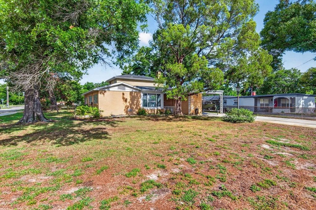 Photo of 825 W Whatley Place, Tampa, FL 33604 (MLS # TB8511444)