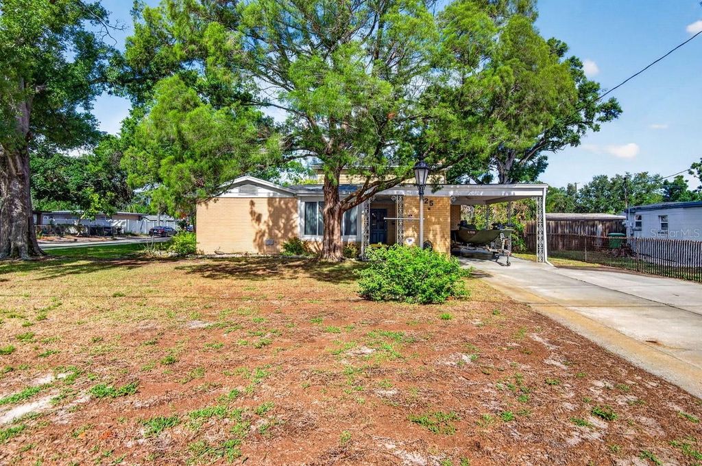 Photo of 825 W Whatley Place, Tampa, FL 33604 (MLS # TB8511444)