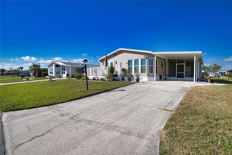 Look no further for your Florida Dream Home! This charming 2 bedroom, 2 bath house is located on a quiet street in a vibrant 55+ community. Enjoy your morning coffee or evening beverage on the front porch overlooking a small pond. On windy days you can
enjoy the outdoors from the comfort of your lanai. Inside the home is bright and airy with lots of natural light. The eat-in kitchen has been beautifully updated with quartz countertops, glass backsplash and solid wood cabinets. This connects to the dining room which flows into the living room. Entertaining friends and family will be a breeze in this home. In addition to the living space, you’ll find an extra room that is currently being used as an office but could also be converted to a laundry room for added ease. The primary bedroom is extremely spacious with a completely updated ensuite bathroom featuring double sinks, a new soaking tub, and a new walk-in shower. New roof 2023,
skylights 2023, New vapor barrier 2023, New high impact front doors 2024, New vinyl siding 2024. Home is being offered partially furnished.  La Casa boasts 974 homes nestled among a variety of native trees with spacious common grounds surrounding our eight lakes.  The ultimate lifestyle on Florida’s Gulf Coast is located between Sarasota and Fort Myers and is a boaters dream with access to the Gulf of Mexico.  It is convenient for shopping, sightseeing, golfing, fishing, and boating, as well as all the culture and elegance the Southwest Florida area is noted for. Residents and visitors enjoy the warmth of Southwest Florida winters in a relaxed and unhurried environment far removed from the hustle of Florida’s east coast. You’ll be surrounded by hundreds of palms reaching for the sky and beautiful mature lush landscaping which demonstrates the utmost level of care our property receives from residents and management. La Casa may have the best pools in the area. Our extremely large, 40 X 60-foot swimming pool is our crown jewel and that is kept at a perfect 87 degrees. Our smaller 20 x 40 pool is quietly nestled between the clubhouse and the Activity Building. Both pools have adjacent hot tubs which are ideal for soaking muscles that are tired from golfing or tennis. Wireless Internet (Wi-Fi) is available at the Clubhouse, Activity Building, and Recreation Hall area where these pools & spas are located, so you can catch some rays while you catch up on your email! Sound enticing? La Casa is a friendly, family community. You will be away from the hustle and bustle except when you want to be part of it. When you leave our gates, North Port is only 1.5 miles from the city center, where you will find every kind of retail store and service you could need. Come for a visit to this self-contained oasis and see for yourself why La Casa is the ultimate destination for both snowbirds and year-round.