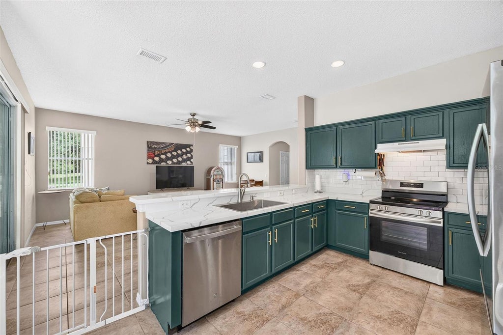 Photo of 2232 Windcrest Lake Circle, Orlando, FL 32824 (MLS # R4911490)